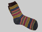 Multicolored patterned sock on a white background