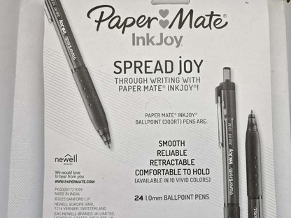 Advertisement for Paper Mate InkJoy pens with product packaging and branding.