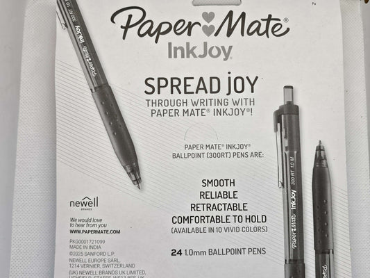 Advertisement for Paper Mate InkJoy pens with product packaging and branding.