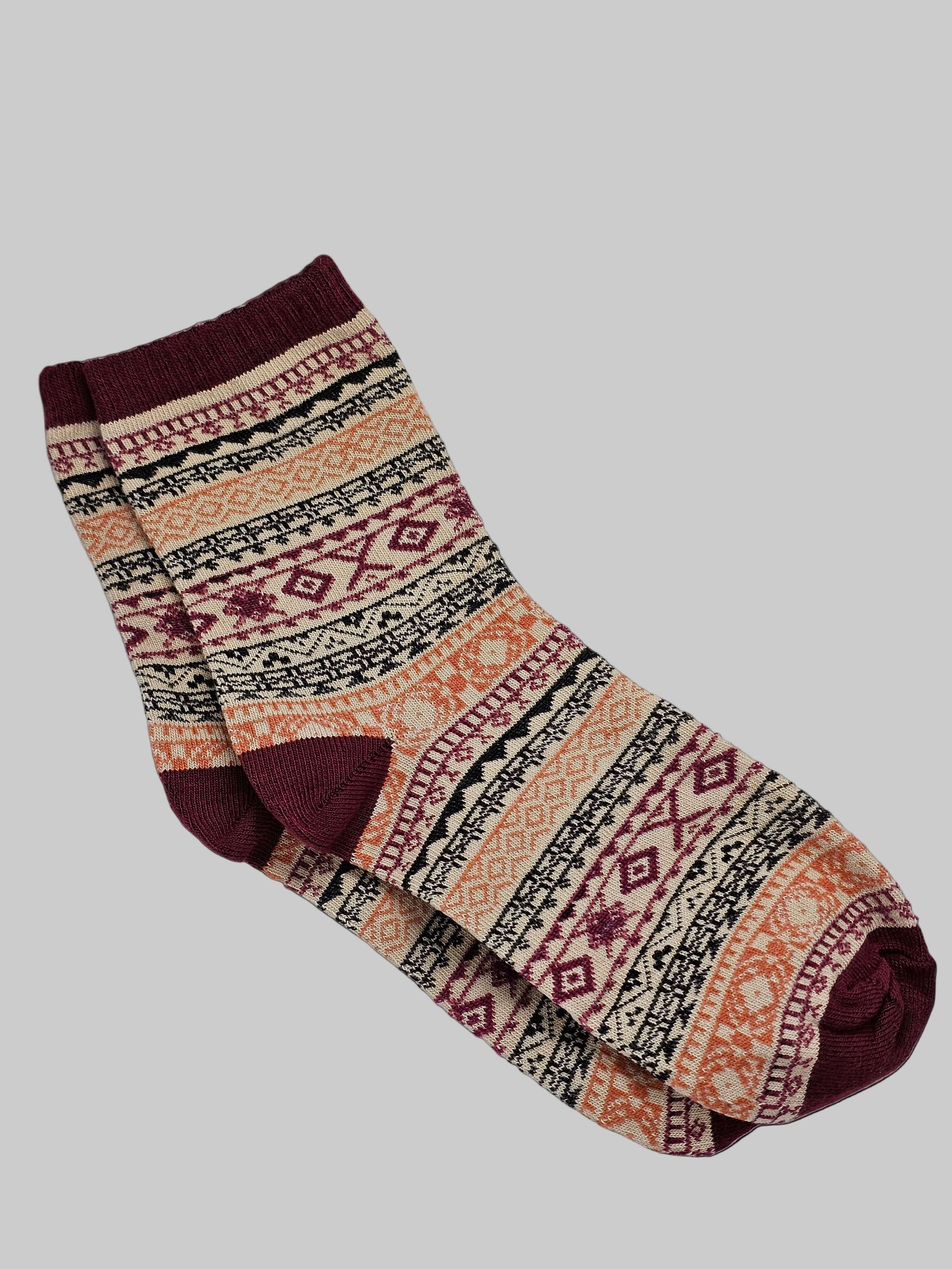 Patterned sock on a white surface