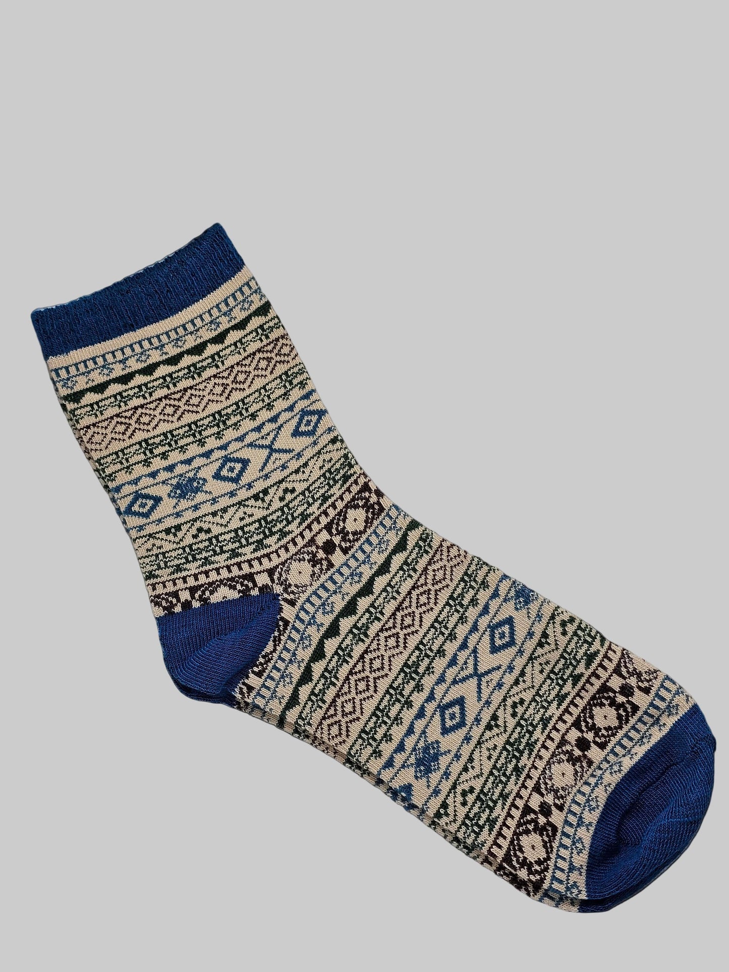 Patterned sock with blue accents on a white background