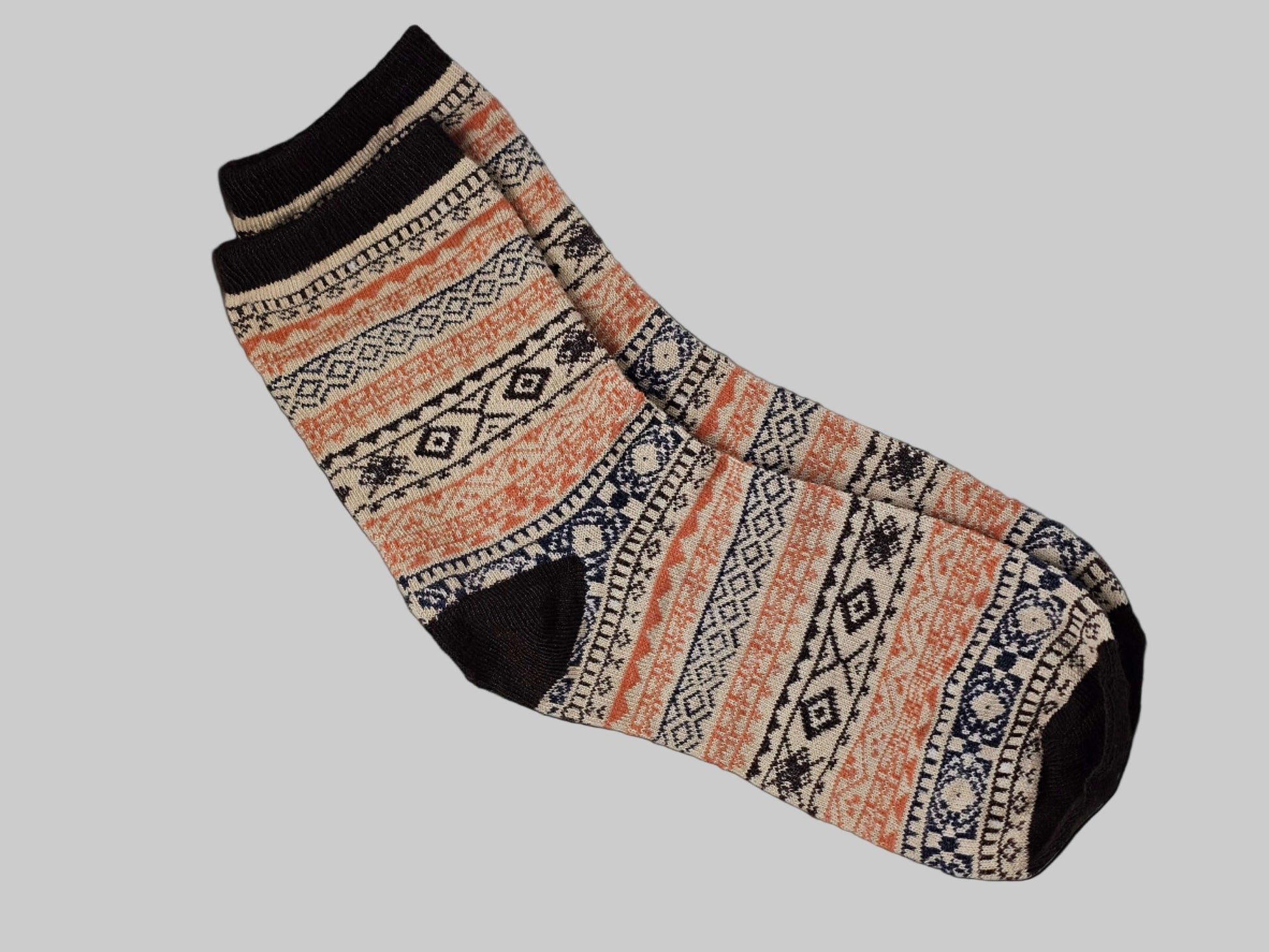 Patterned sock on a white surface