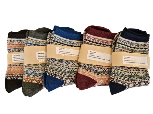 Set of patterned socks on a wooden surface