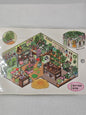 Board game box with colorful garden design on a gray background