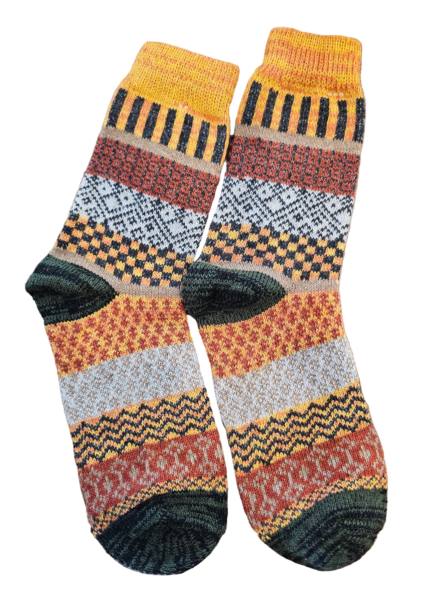 Set of patterned socks on a wooden surface