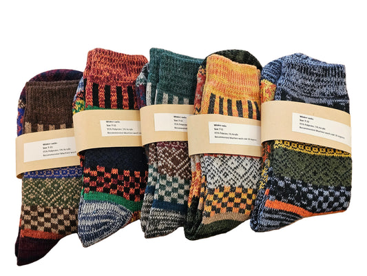 Set of patterned socks on a wooden surface