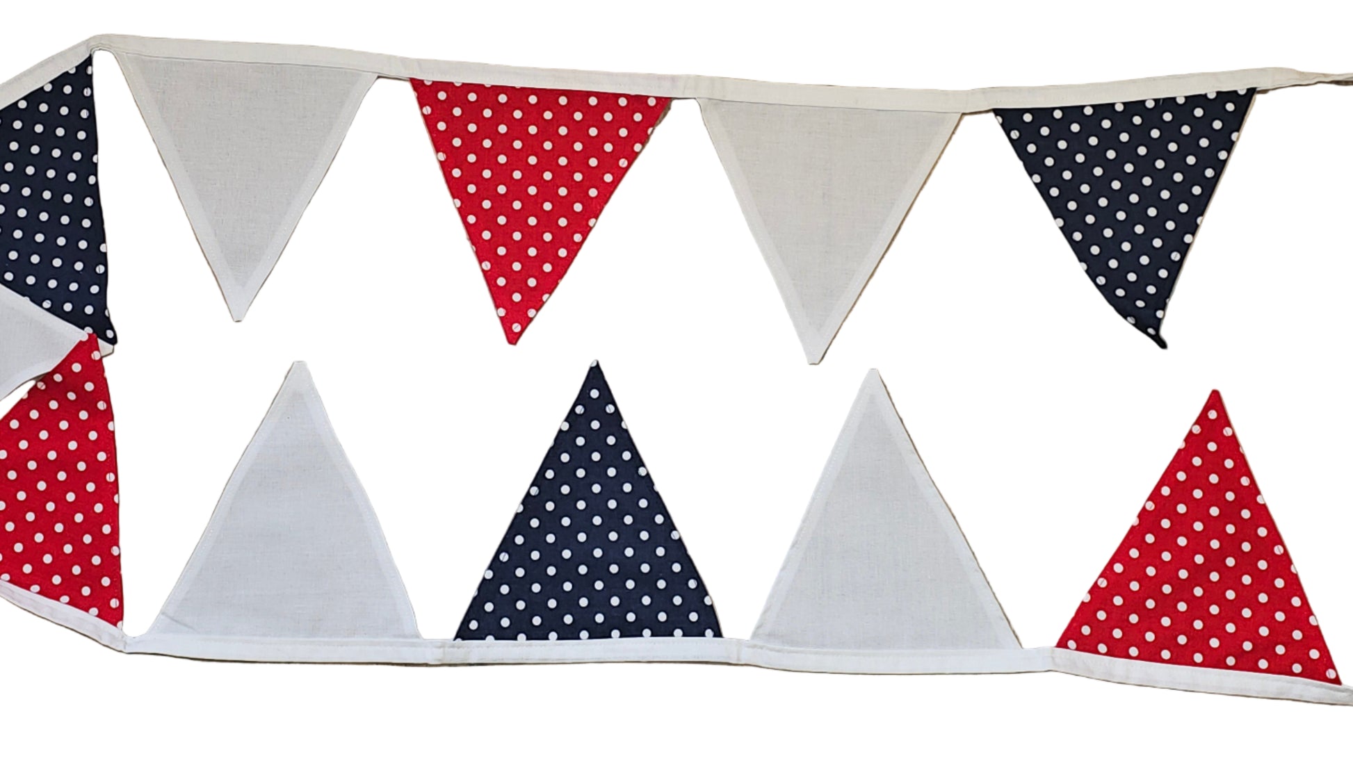 Fabric banner with red, white, and blue triangles on a wooden surface