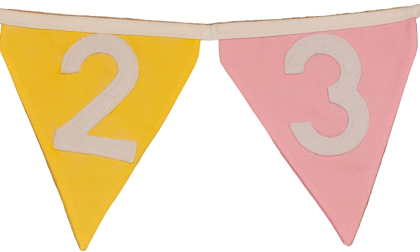 Numbered triangular flags with '2' on yellow, '3' on pink, and red flag partially visible on a wooden floor.