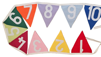 Colorful number banner on a wooden surface