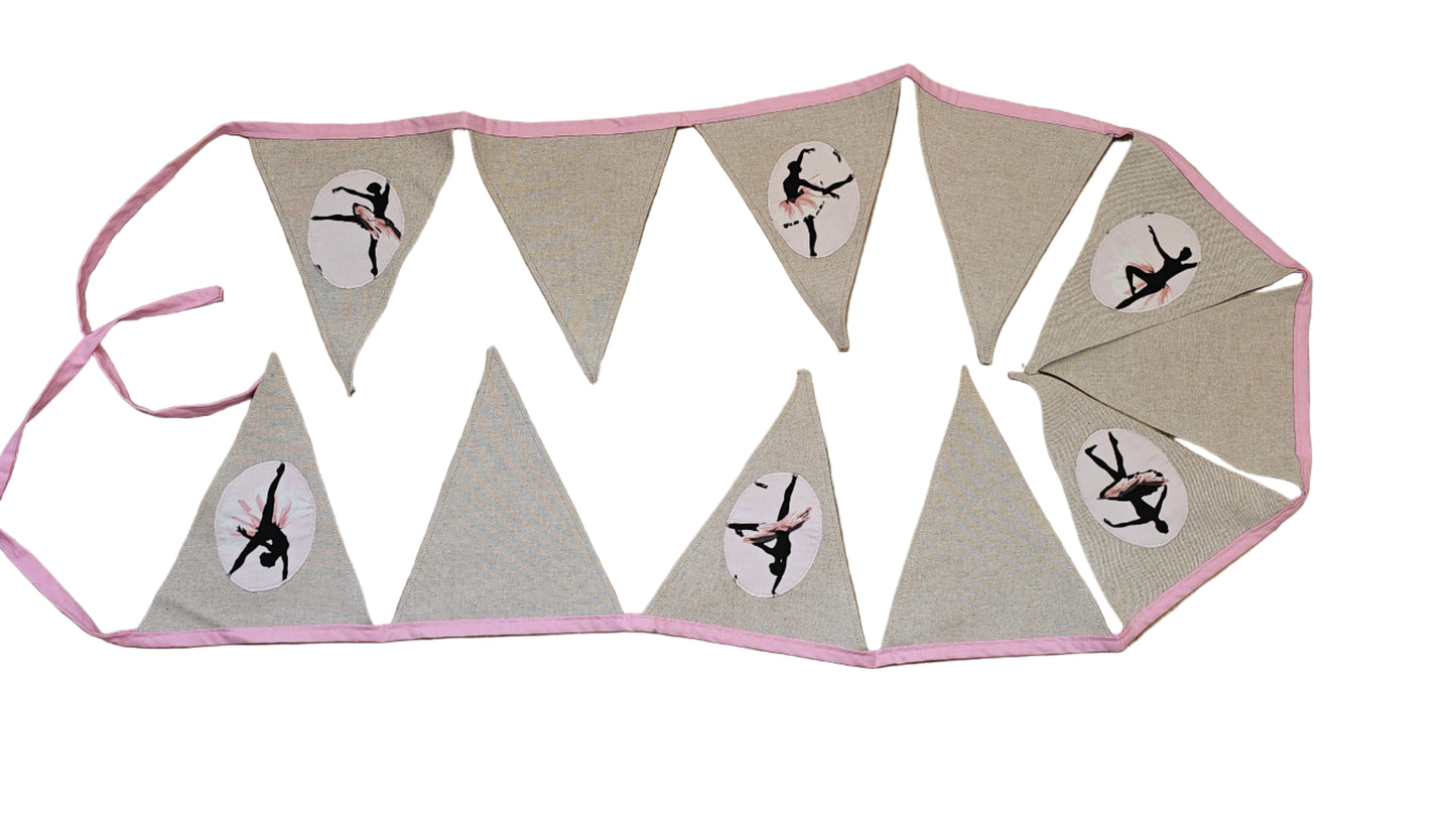 Decorative banner with geometric shapes and dancer illustrations on a wooden floor.