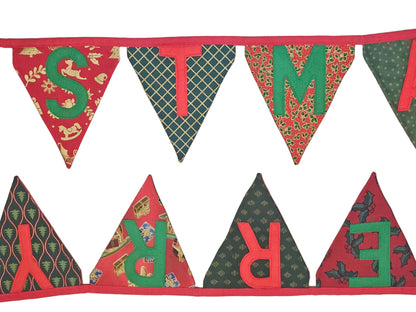 Decorative Christmas banner with patterned letters on a wooden background