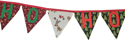 Christmas-themed fabric banner with 'HO HO HO' on a wooden floor.