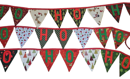 Christmas-themed banner with 'HO HO HO' text on a wooden background