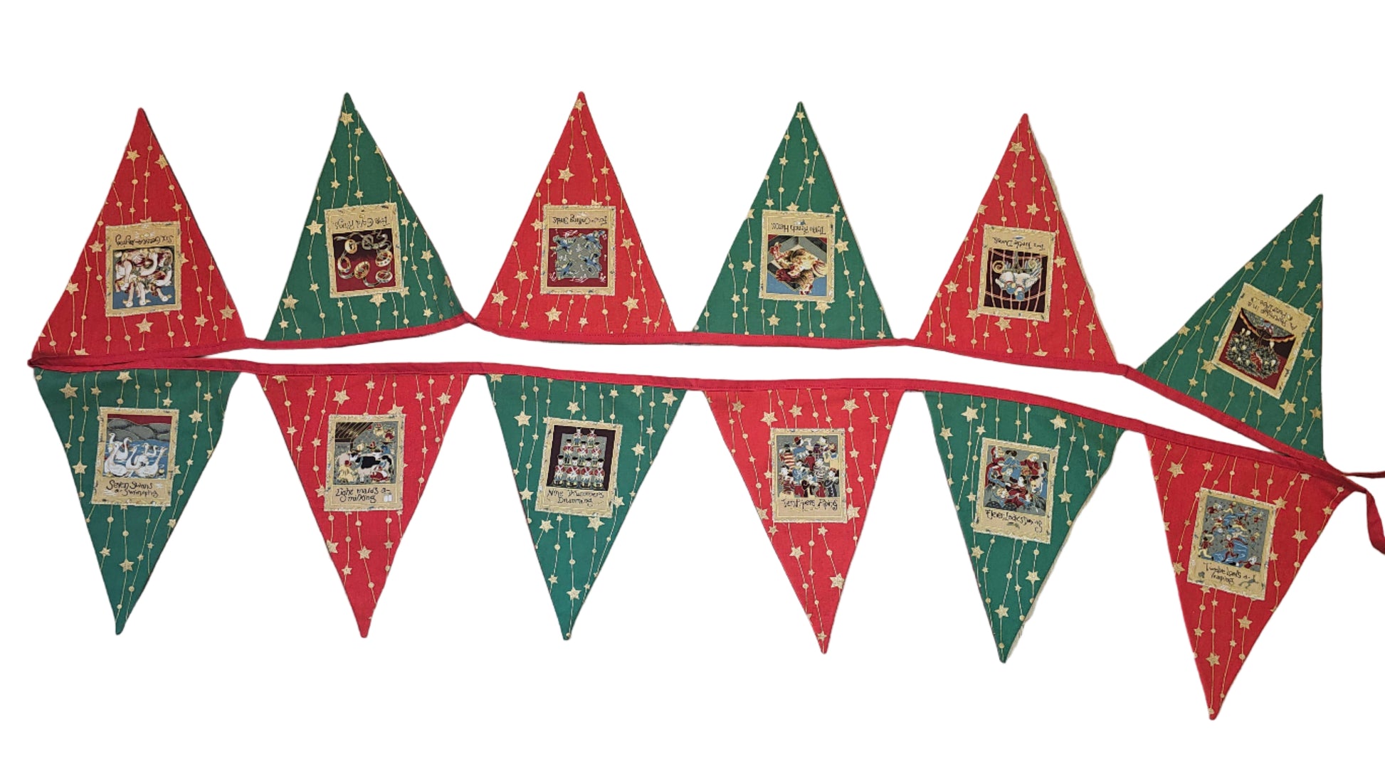 Christmas-themed banner with red and green triangles on a wooden floor.