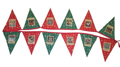 Christmas-themed banner with red and green triangles on a wooden floor.