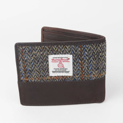 Harris Tweed wallet with checkered pattern and brand label on a white background