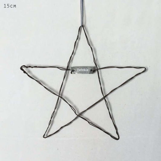 Star-shaped wire ornament with 'Twinkle' label on a white background