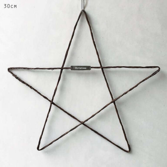 Wire star decoration with a label on a white background