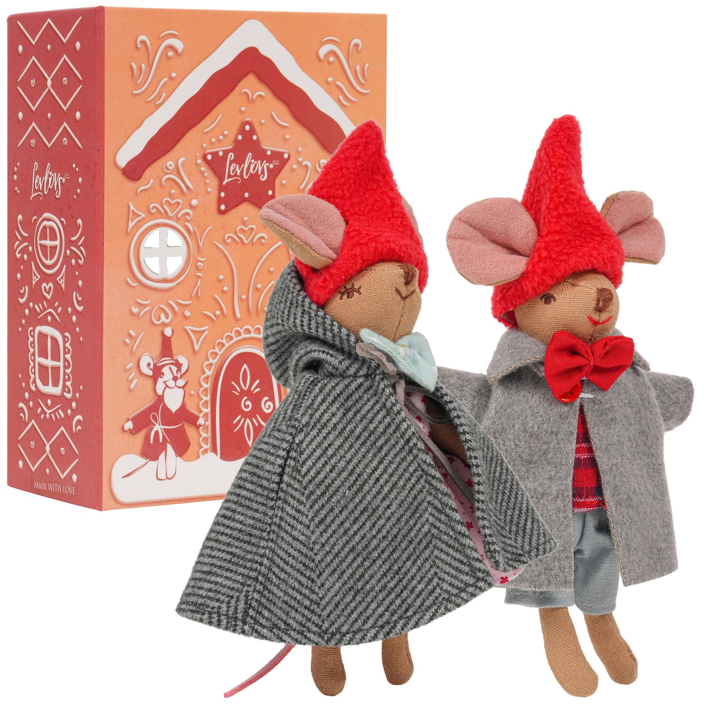 Two toy figures with red hats and gray cloaks in front of a decorative box.