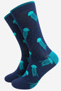 Navy socks with teal jellyfish pattern on a white background