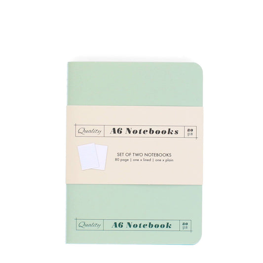 Set of two A6 notebooks with a green and beige design on a white background