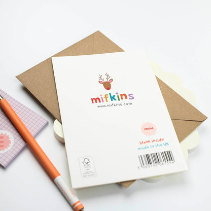 Notebook with a brown envelope and pen on a white background, featuring the brand 'mifkins'.