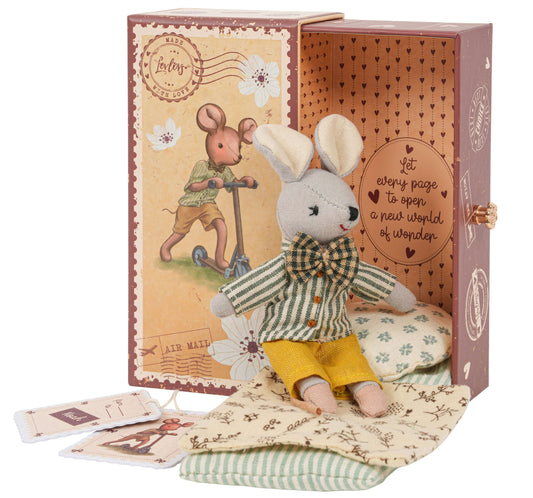 Stuffed mouse toy with a bow tie and outfit in a decorative box