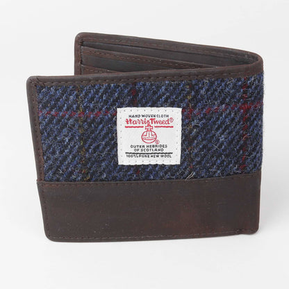 Harris Tweed wallet with a visible label on a white background
