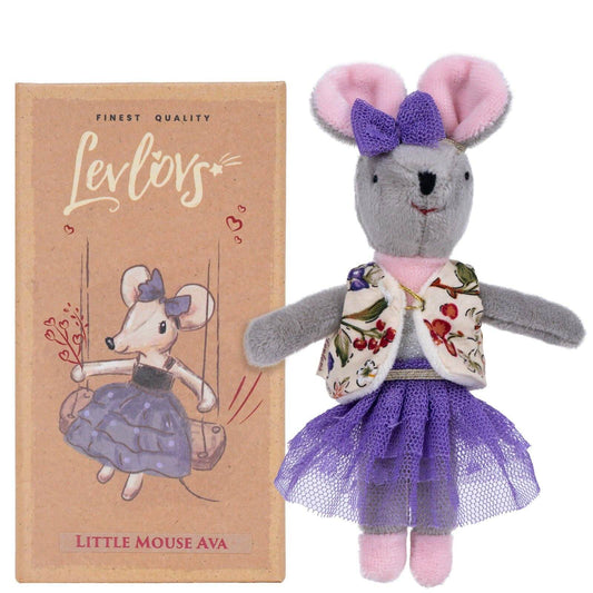Stuffed mouse toy with a purple bow and dress next to its packaging