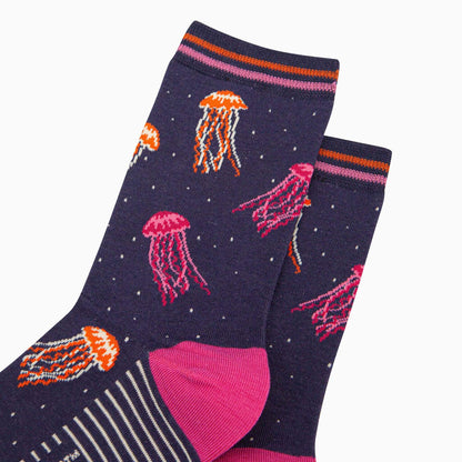 Pair of socks with jellyfish pattern on a white background