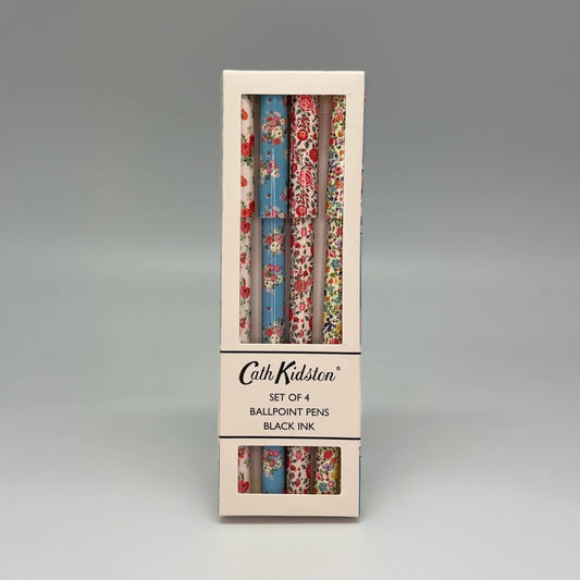 Set of 4 ballpoint pens in floral packaging with Cath Kidston branding on a gray background
