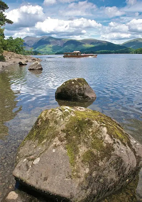Steve Blake Photography Greetings Cards featuring a scenic view of the Lake District with rocks and a boat.