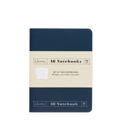 Set of two A6 notebooks with navy blue covers on a white background