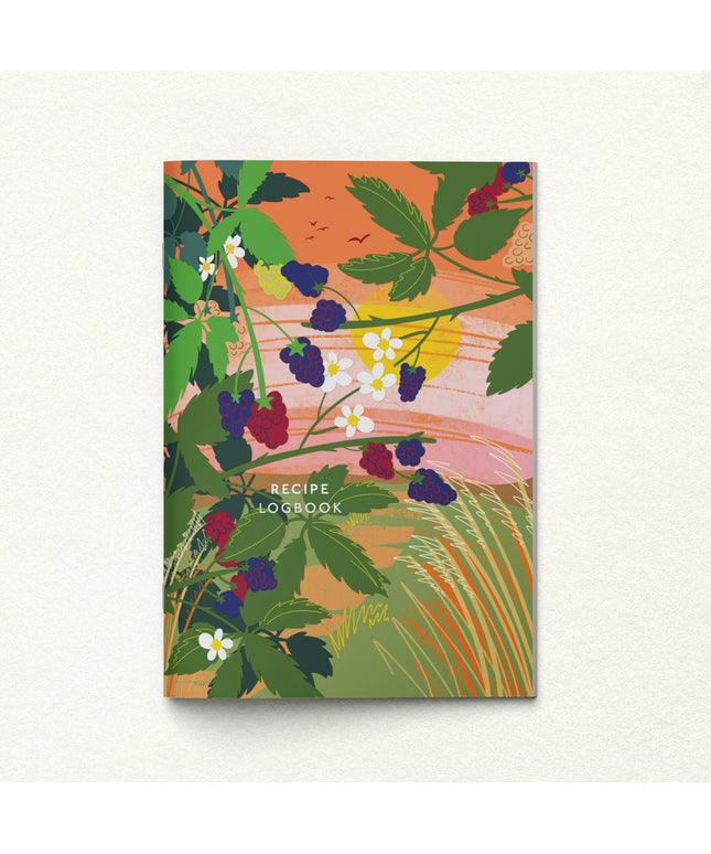 Recipe logbook with floral design on a white background