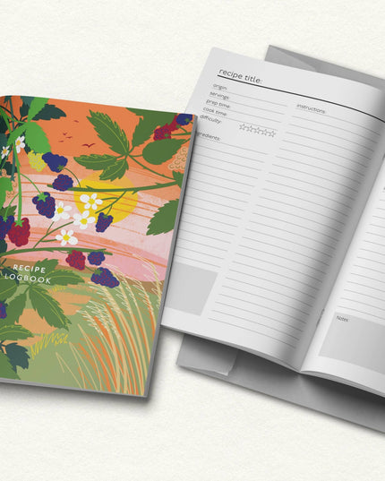 Floral design recipe book with open pages on a white background