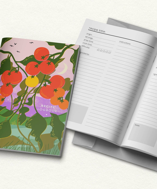 Recipe logbook with tomato-themed cover and open pages on a white background