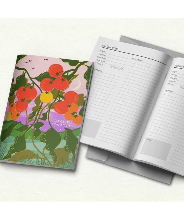 Recipe logbook with tomato-themed cover and open pages on a white background