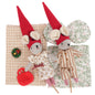 Two mouse-like dolls with red hats on checkered and floral backgrounds