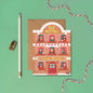Greeting card with 'Elf Hotel' design on a green background