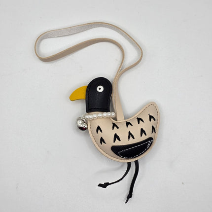 A bird bag charm