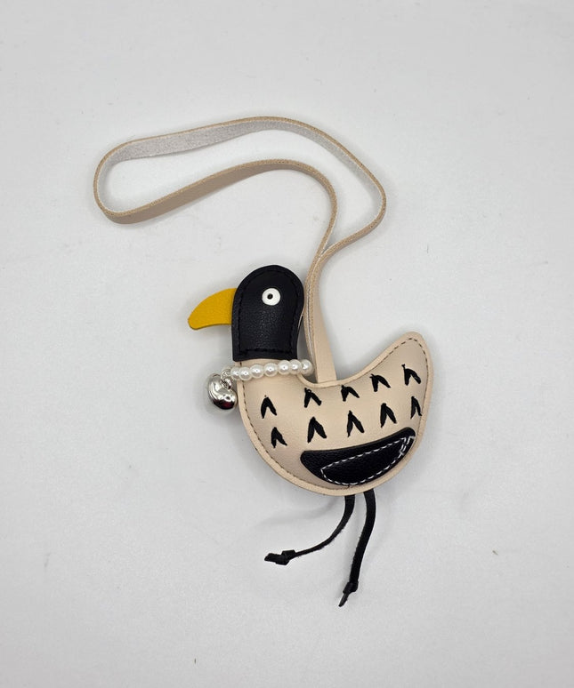 A bird bag charm
