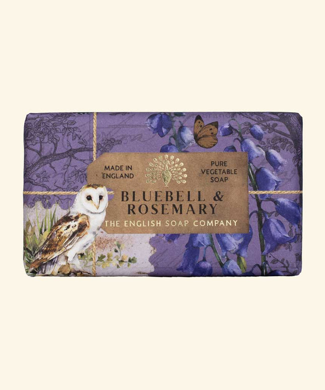 Soap bar with 'Bluebell & Rosemary' packaging featuring an owl and flowers on a beige background