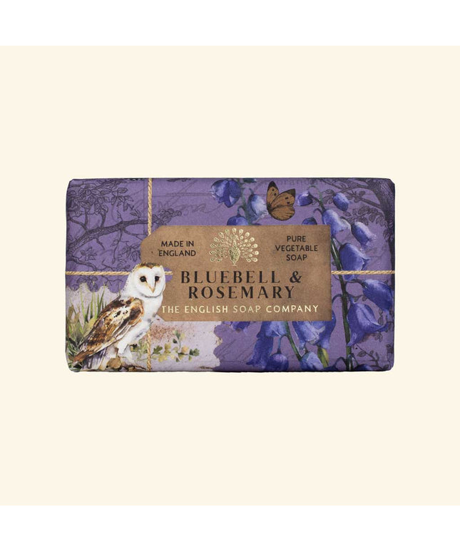 Soap bar with 'Bluebell & Rosemary' packaging featuring an owl and flowers on a beige background