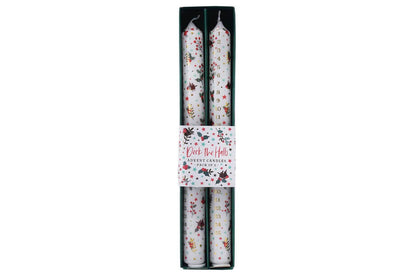 Two floral-patterned candles in a black and white packaging on a white background