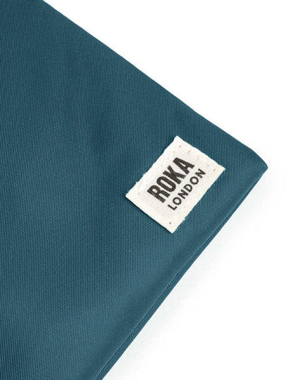ROKA London: Chelsea Sling Bag in Teal Nylon
