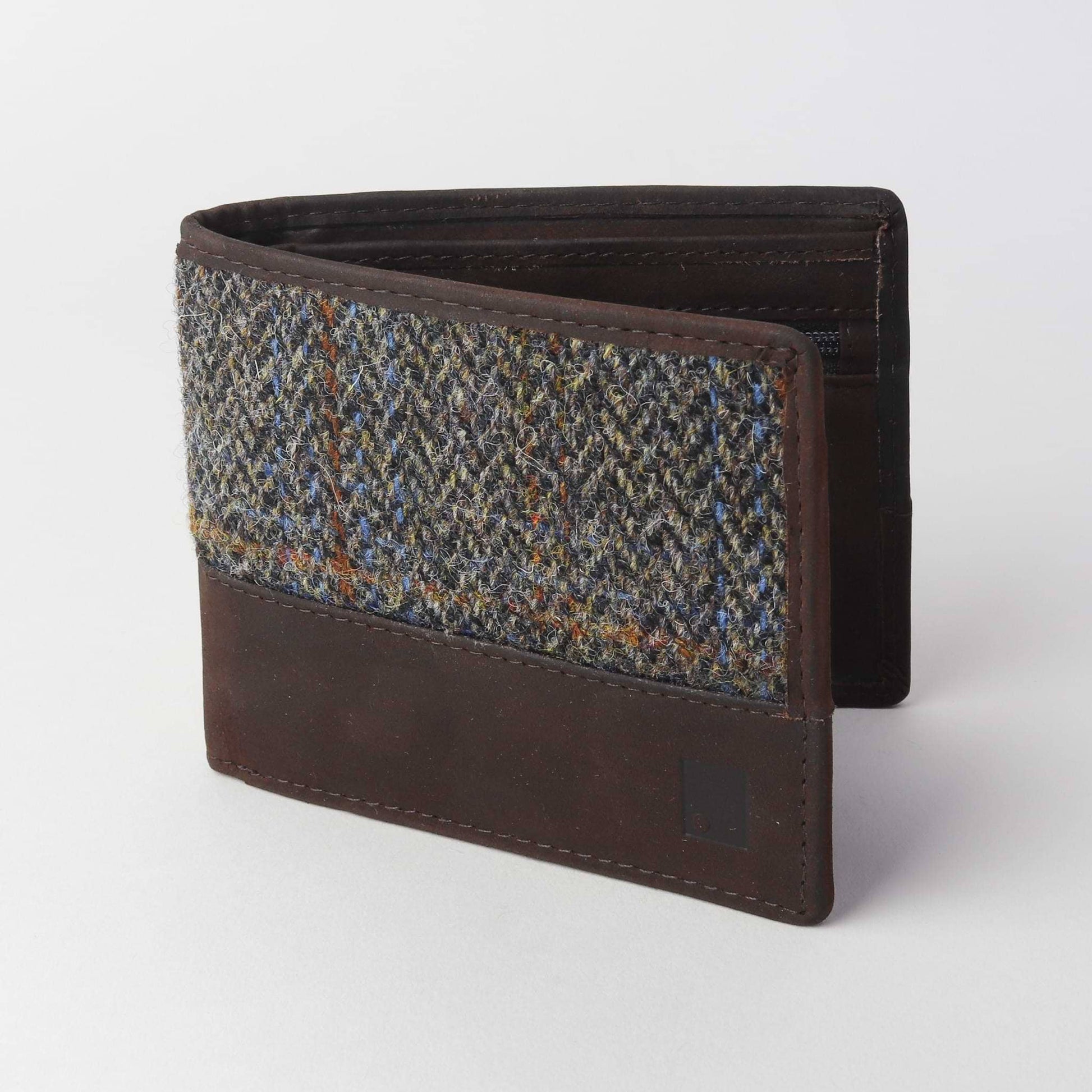 Brown wallet with patterned flap on a white background