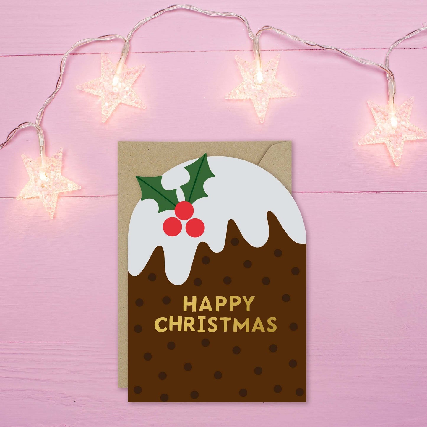 Christmas card with a festive design on a pink background with star lights.