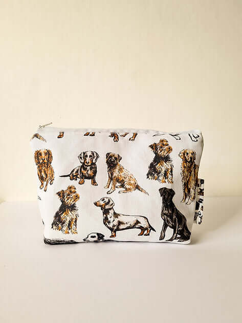 Pouch with dog illustrations on a beige background