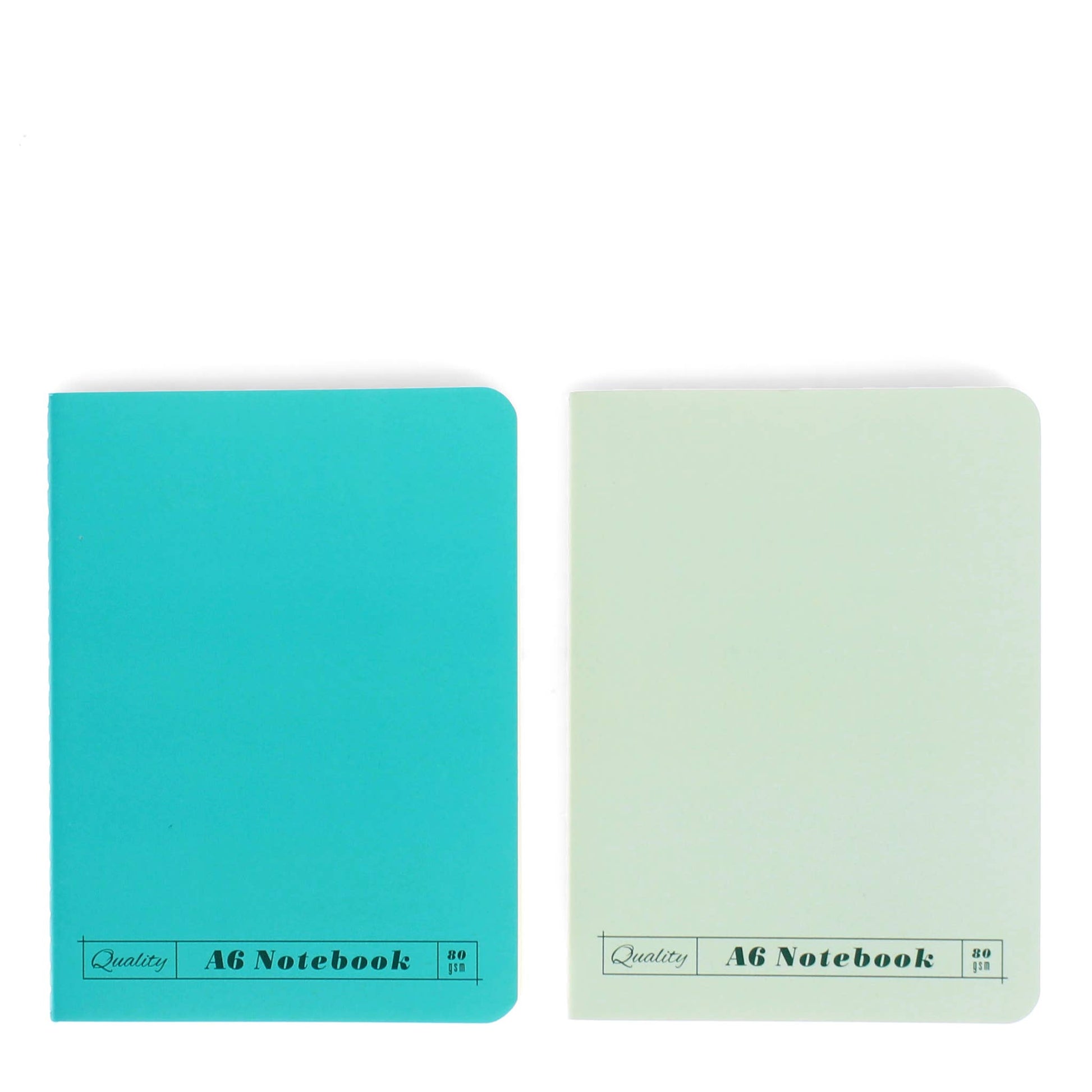 Two notebooks, one turquoise and one light green, on a white background.