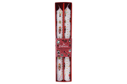 Set of candles in a decorative box with Christmas-themed designs on a white background